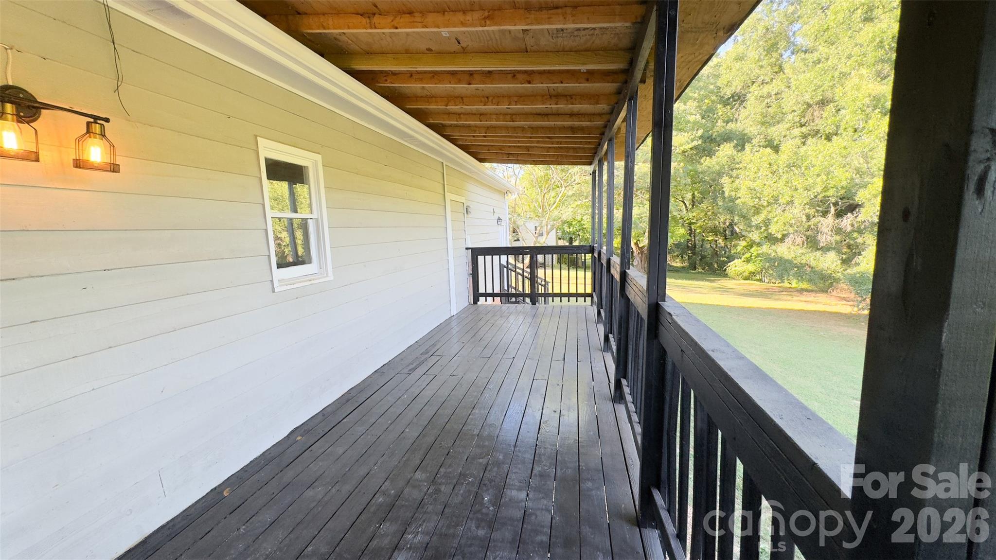 3014 Morgan Mill Road Monroe, NC 28110 - Photo 7 of 26 a view of outdoor space with wooden floor and city view