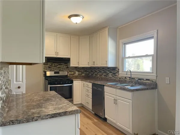 $1,850 | 6435 Wells Drive, Unit LEFT, De Witt, NY 13057