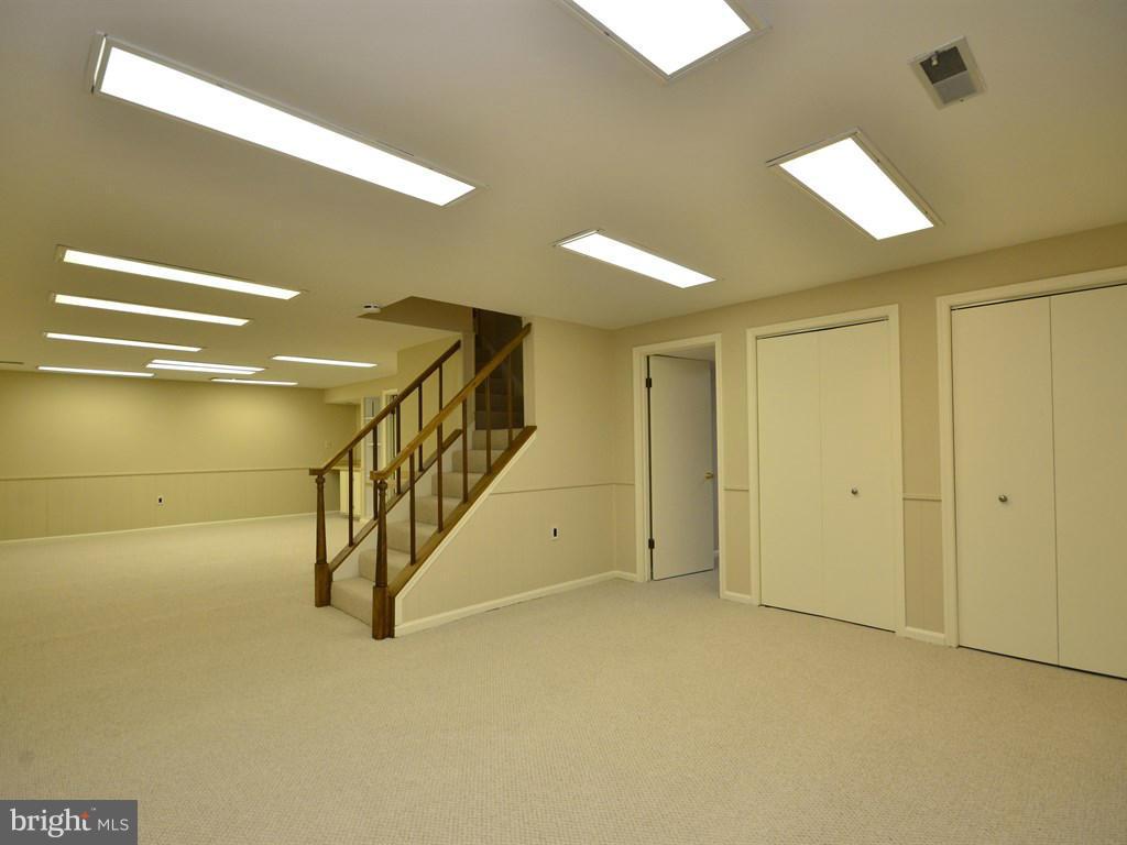 17 Pebble Ridge Court Potomac, MD 20854 - Photo 24 of 29 a view of an empty room with stairs