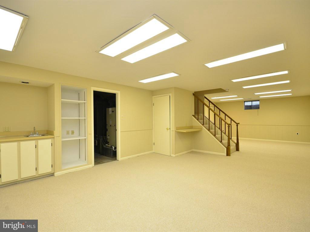 17 Pebble Ridge Court Potomac, MD 20854 - Photo 25 of 29 a view of an empty room with stairs