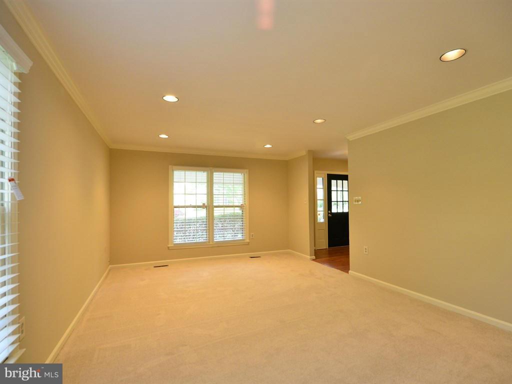 17 Pebble Ridge Court Potomac, MD 20854 - Photo 4 of 29 a view of an empty room with a window