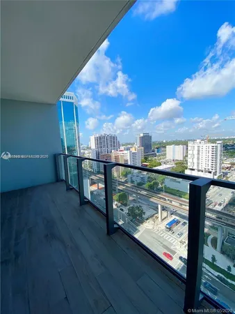 a view of a lake from a balcony