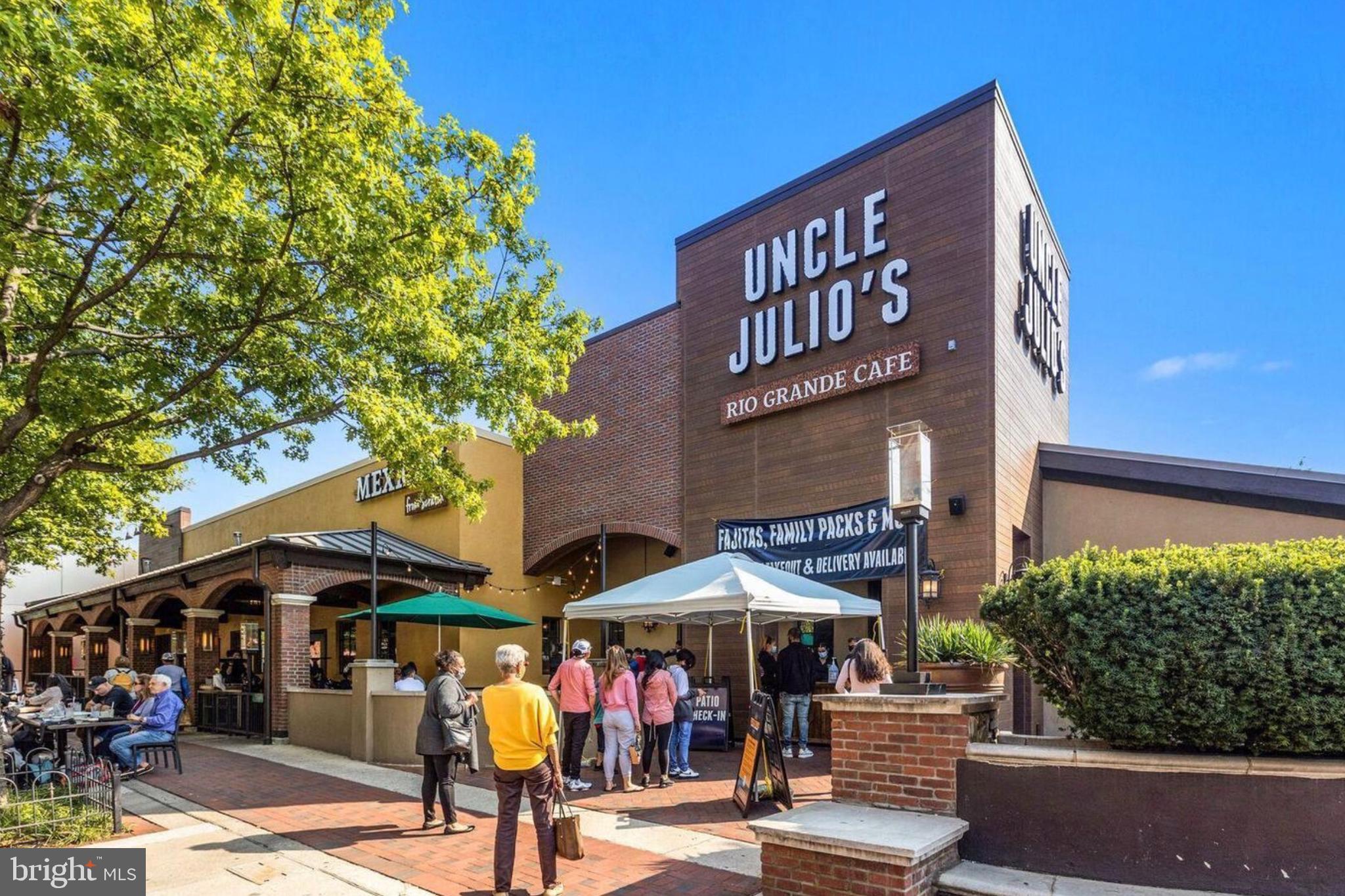 5050 Bradley Boulevard, Unit 6 Chevy Chase, MD 20815 - Photo 24 of 25 a front view of a building with street
