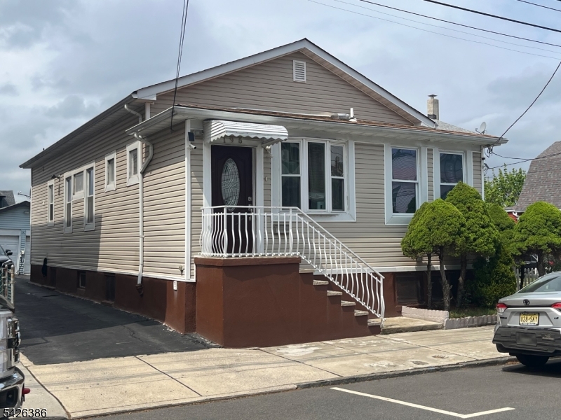 a view of a house with a roof deck