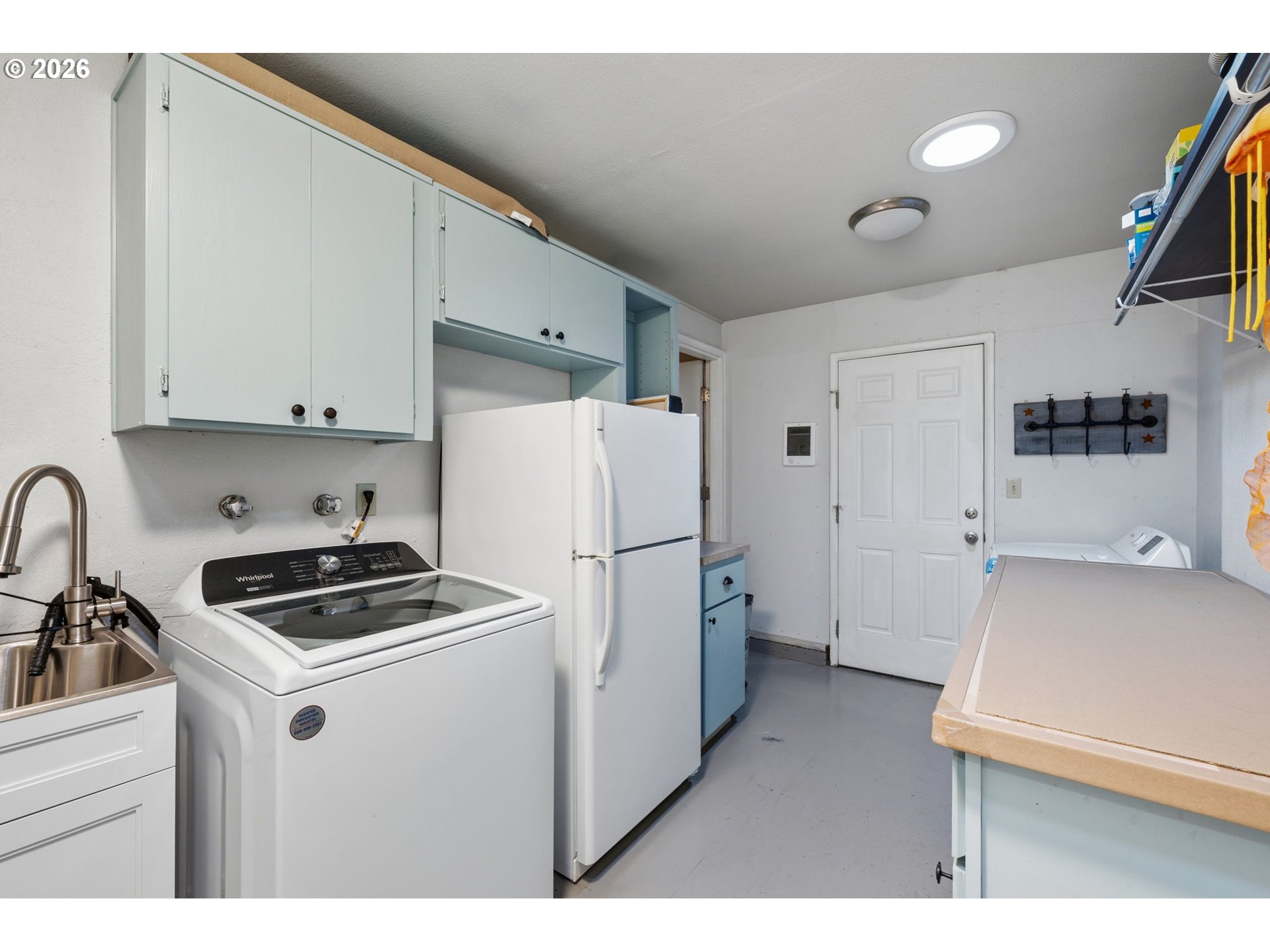 2936 Game Farm Road Springfield, OR 97477 - Photo 17 of 25 a kitchen with a refrigerator a stove a microwave and cabinets