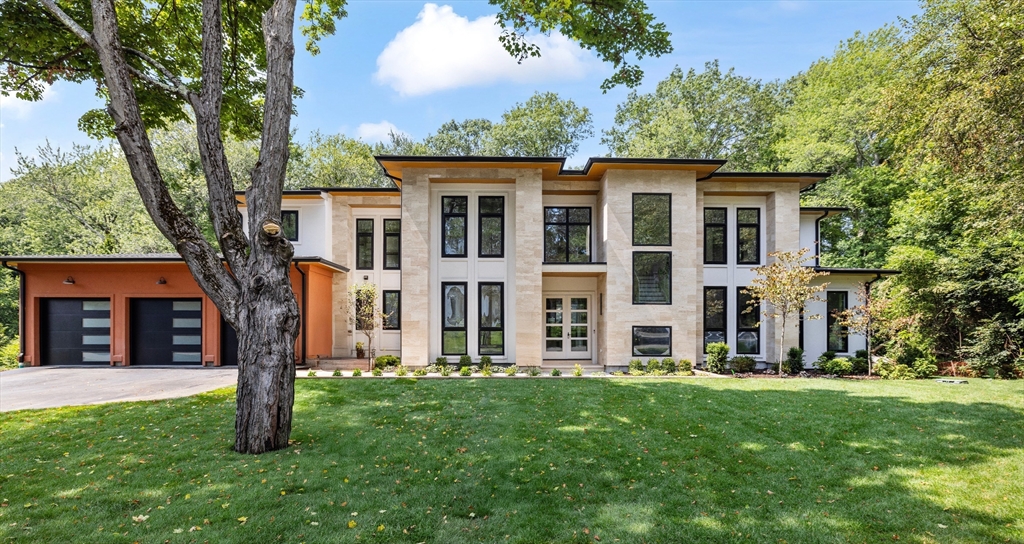 front view of a house with a yard