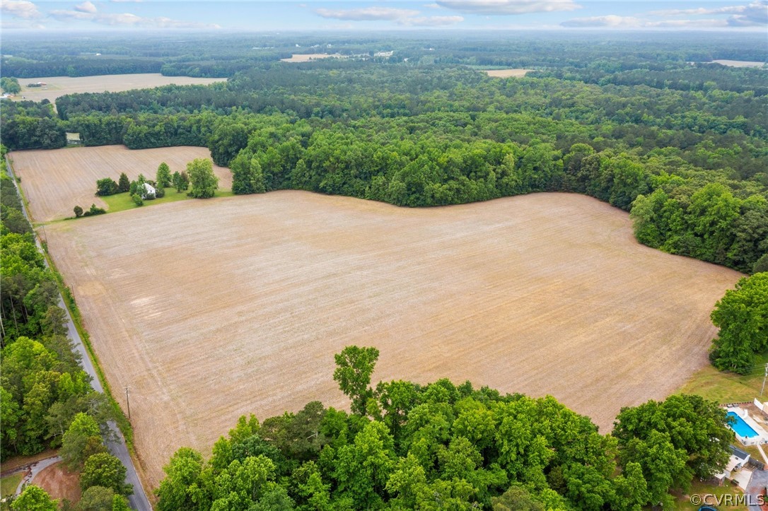 21108 Horseshoe Road Carson, VA 23830 - Photo 6 of 15 an aerial view of a house with a yard and lake view