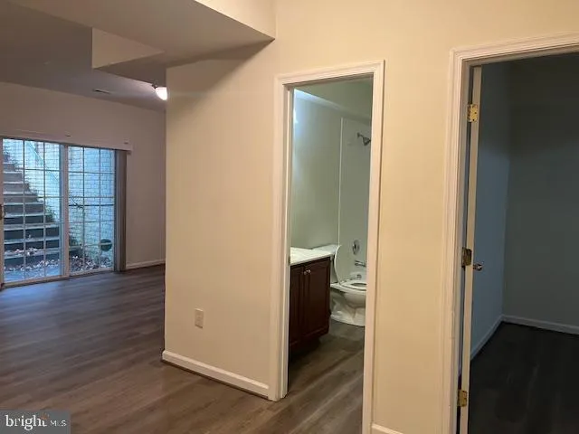 a kitchen with a stove and a refrigerator