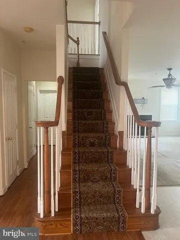 a view of entryway with wooden floor
