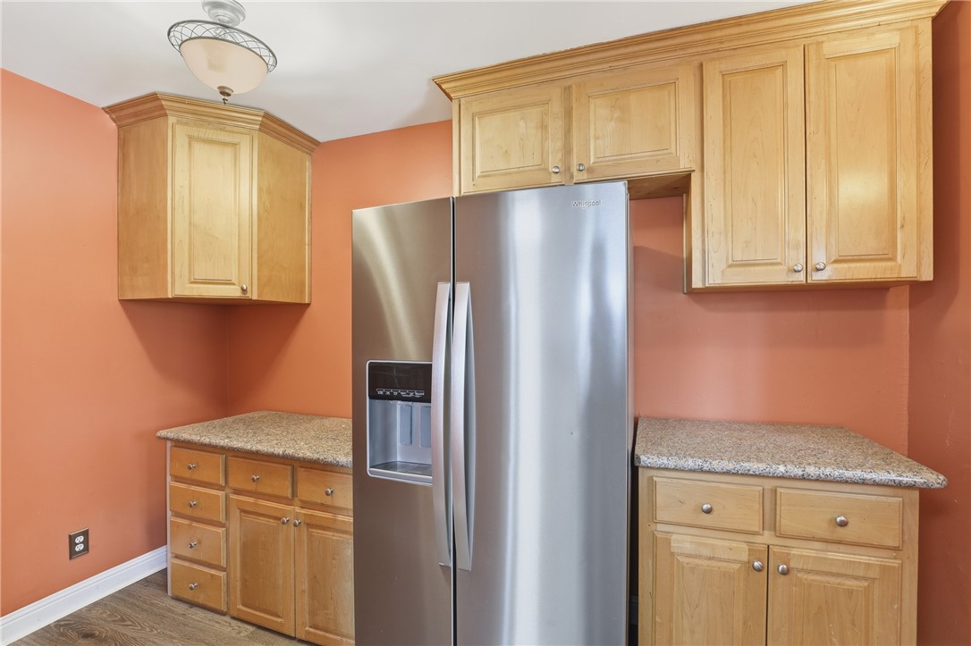 4304 Old Buncombe Road Greenville, SC 29617 - Photo 12 of 49 This functional kitchen features ample storage and stainless steel appliances, perfect for everyday living.