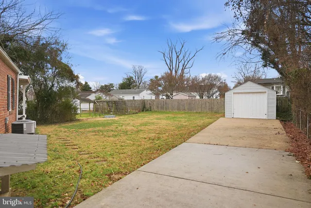 a view of a yard with an outdoor space