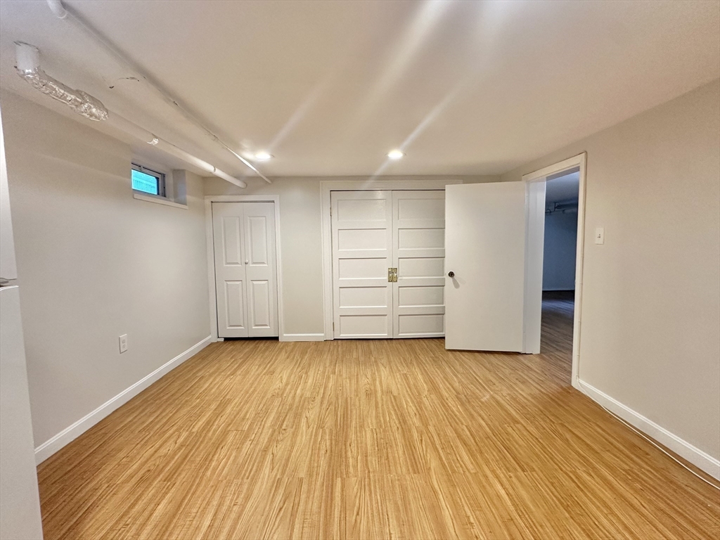8 A Mellon Road Wellesley, MA 02482 - Photo 12 of 22 a view of a room with wooden floor