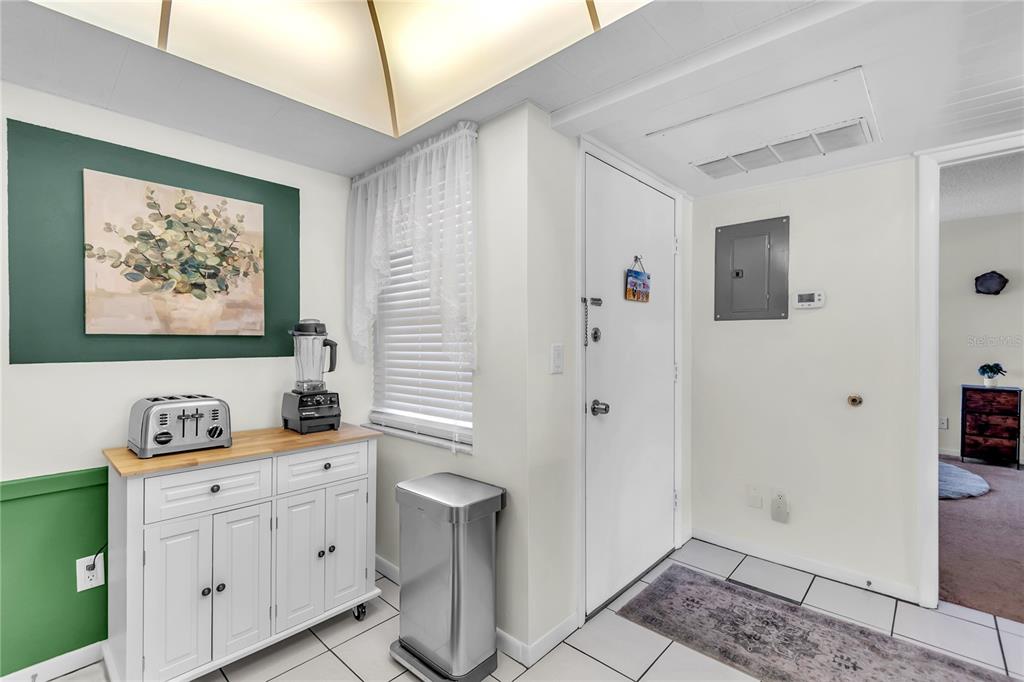12200 Vonn Road, Unit 2206 Largo, FL 33774 - Photo 11 of 60 a room with mirror and window