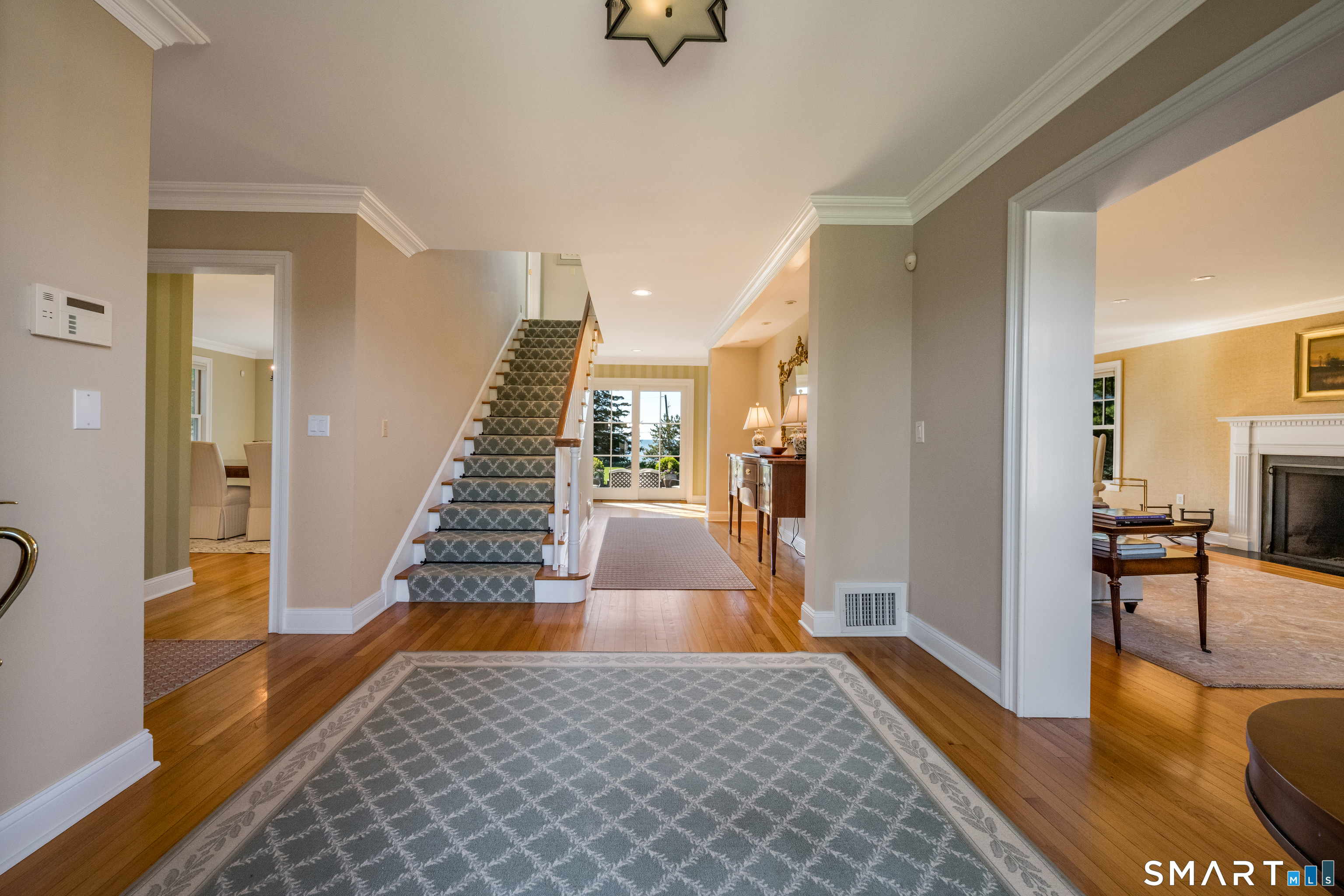 28 Walden Hill Road Guilford, CT 06437 - Photo 12 of 35 a view of a hallway view with living room and wooden floor