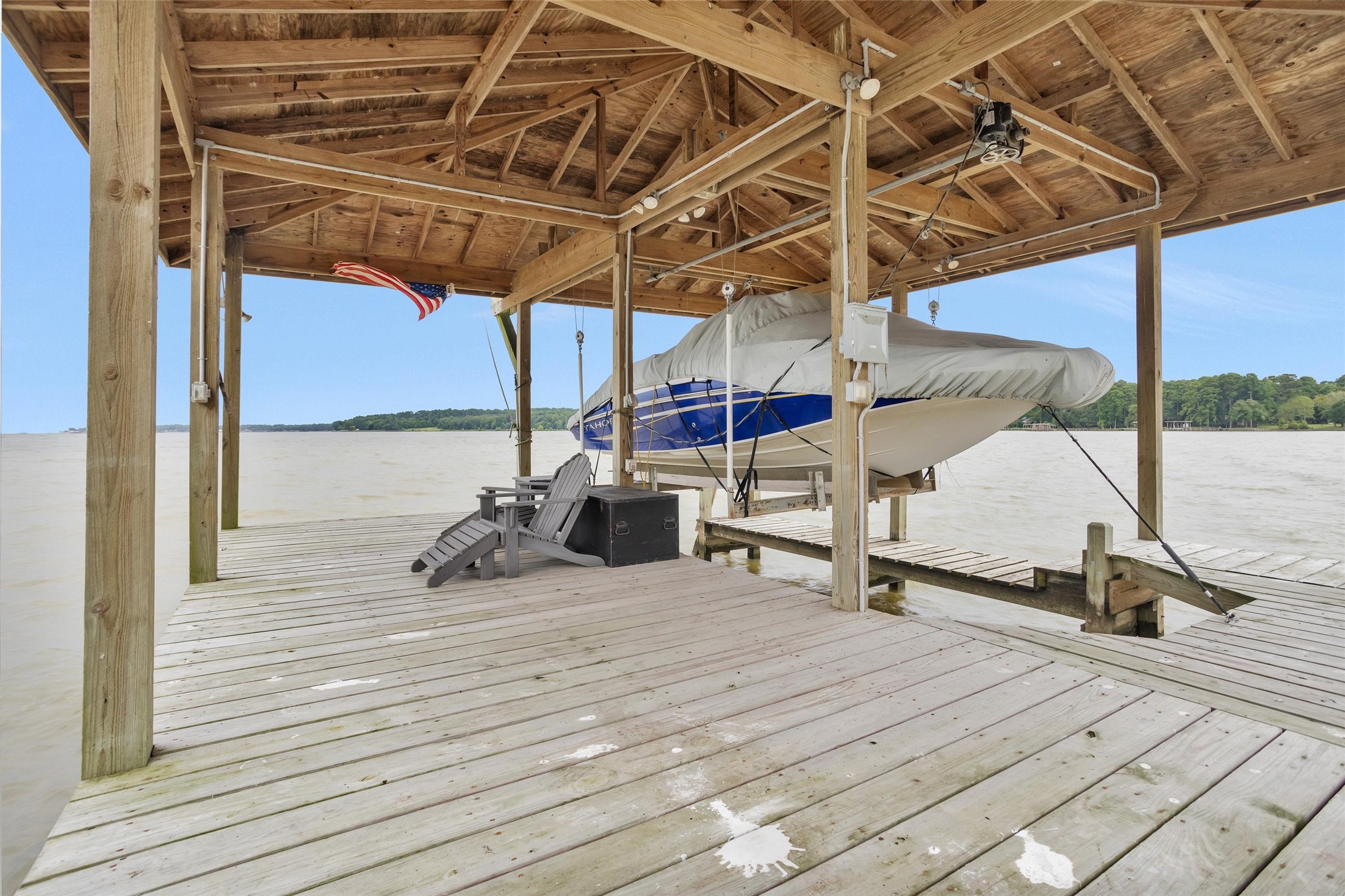 270 Johnson Road Coldspring, TX 77331 - Photo 11 of 26 The boathouse features a spacious dock, boat lift and 110 power is available including a master breaker for the boathouse.