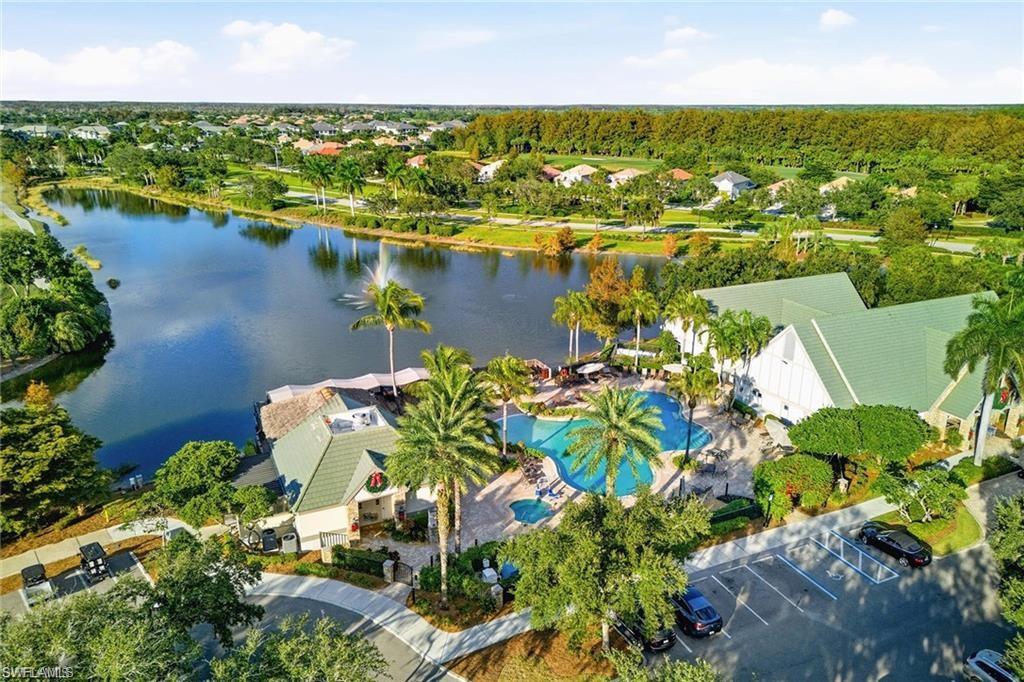 12095 Wicklow Lane Naples, FL 34120 - Photo 38 of 50 an aerial view of residential houses with outdoor space and lake view