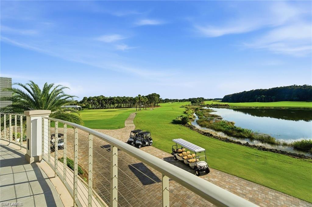 12095 Wicklow Lane Naples, FL 34120 - Photo 43 of 50 a view of a swimming pool and a yard