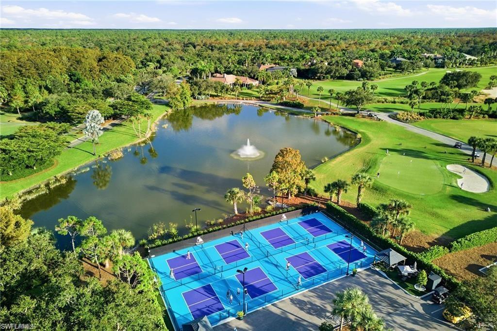 12095 Wicklow Lane Naples, FL 34120 - Photo 44 of 50 an aerial view of a houses with a lake view