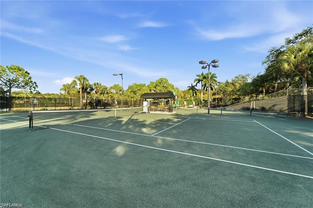 12095 Wicklow Lane Naples, FL 34120 - Photo 45 of 50 a view of a tennis court