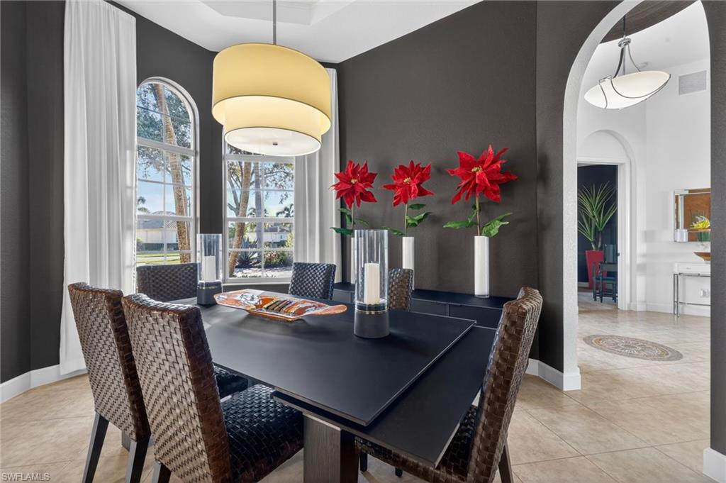 12095 Wicklow Lane Naples, FL 34120 - Photo 6 of 50 a dining room with furniture and window