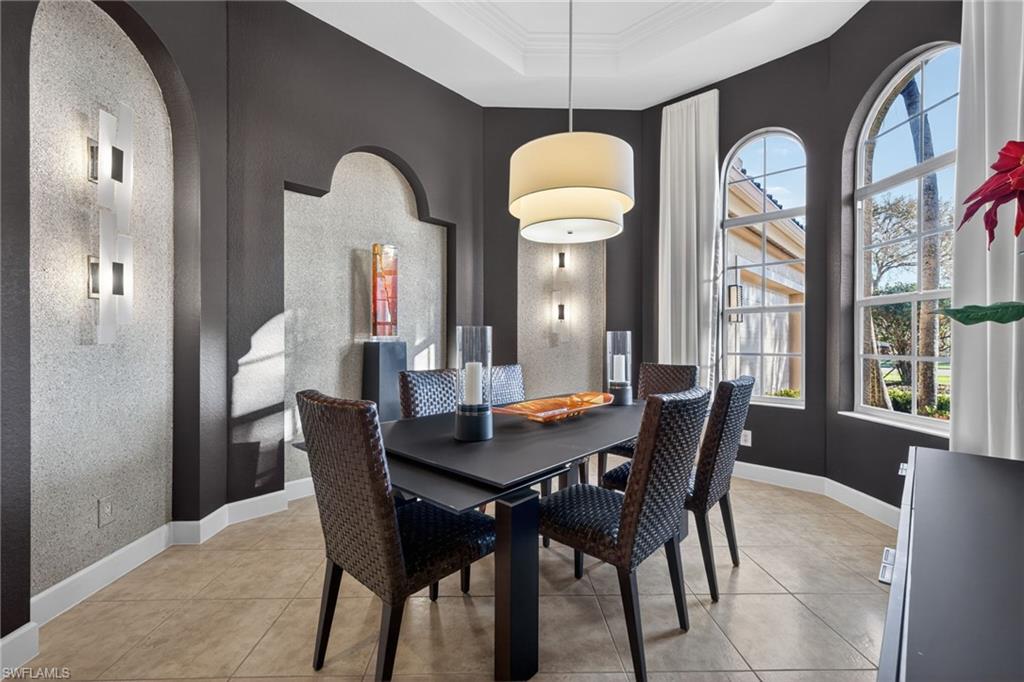 12095 Wicklow Lane Naples, FL 34120 - Photo 7 of 50 a dining room with furniture and window