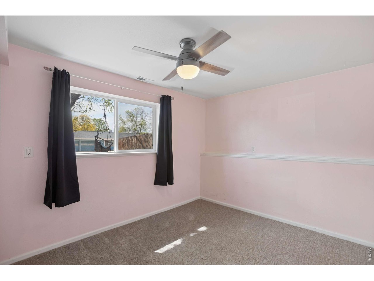 158 4th Street Firestone, CO 80520 - Photo 14 of 32 a view of an empty room with a window