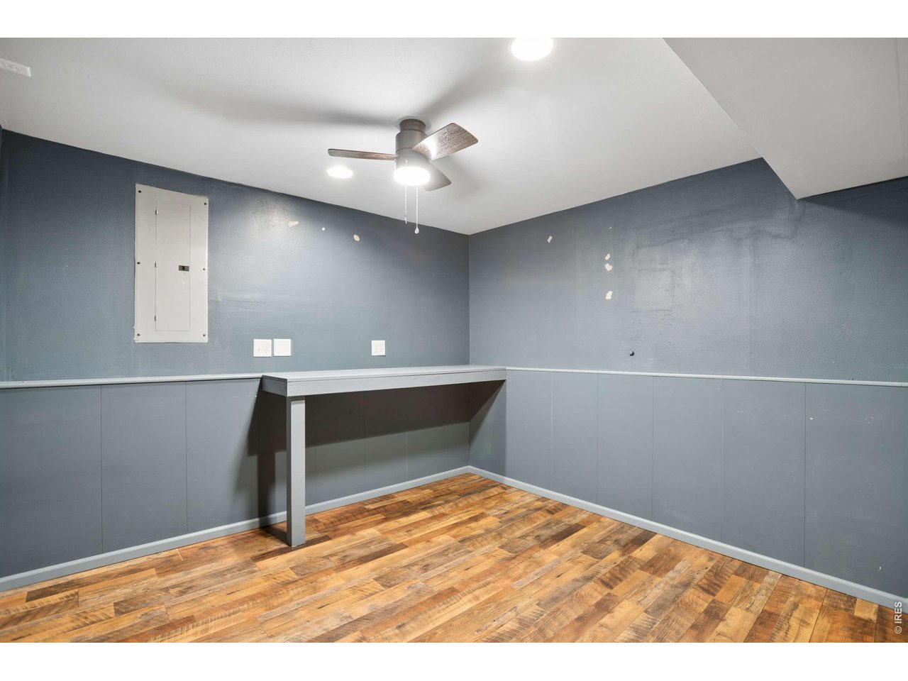 158 4th Street Firestone, CO 80520 - Photo 19 of 32 a view of empty room with wooden floor