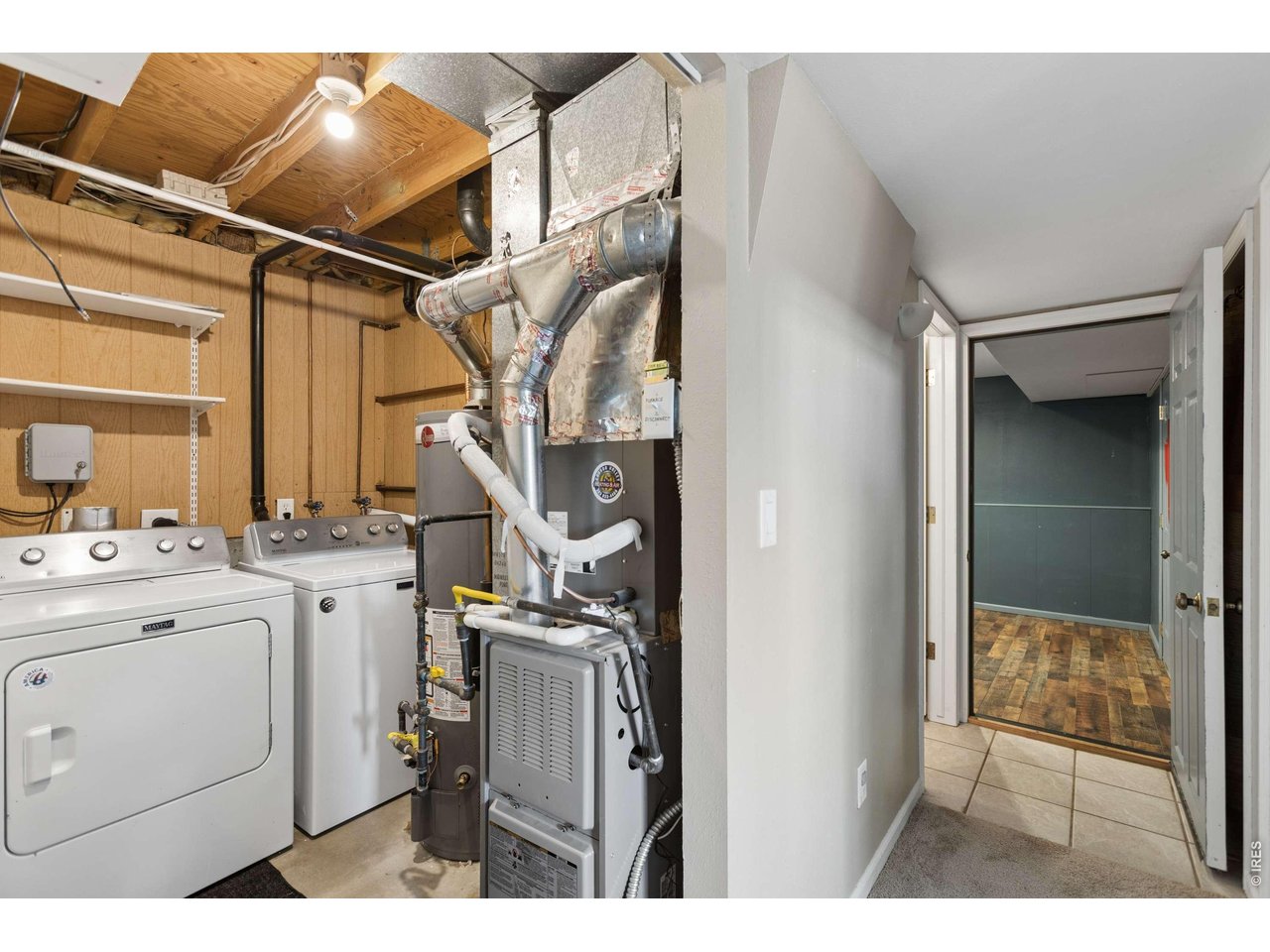 158 4th Street Firestone, CO 80520 - Photo 20 of 32 a utility room with dryer and washer