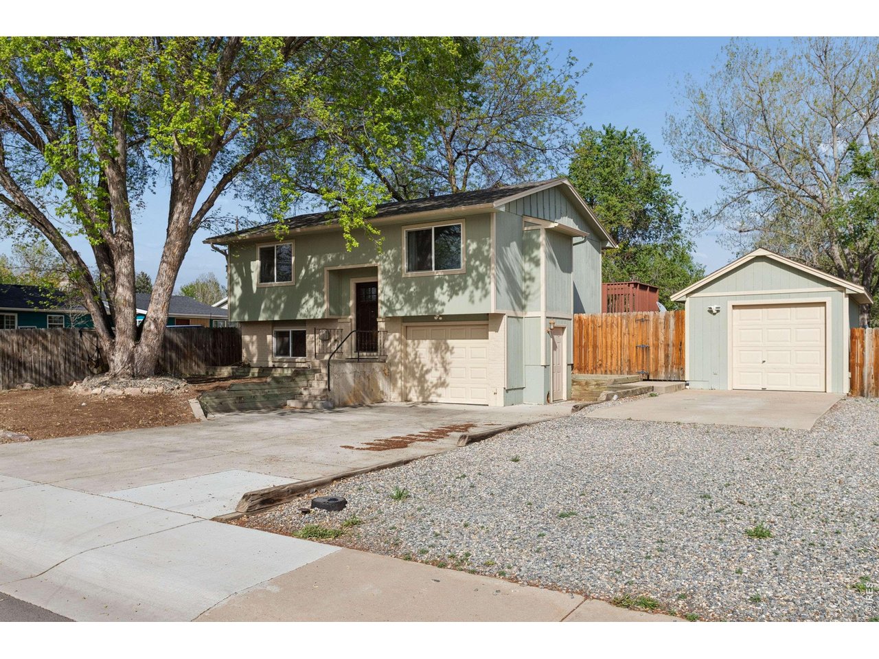 158 4th Street Firestone, CO 80520 - Photo 26 of 32 a front view of a house with a yard