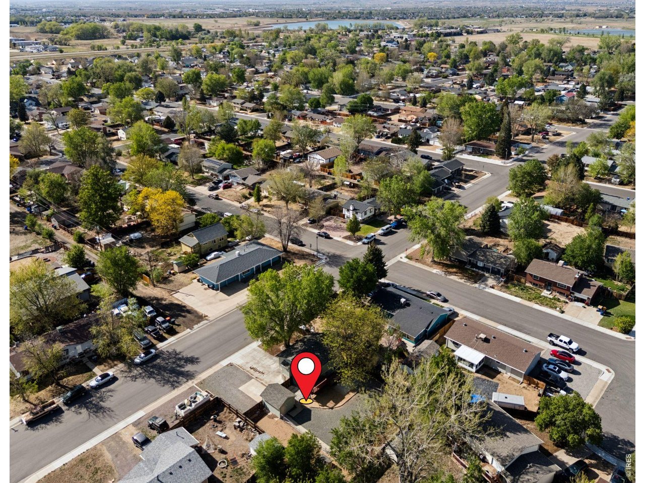 158 4th Street Firestone, CO 80520 - Photo 30 of 32 an aerial view of residential houses with outdoor space