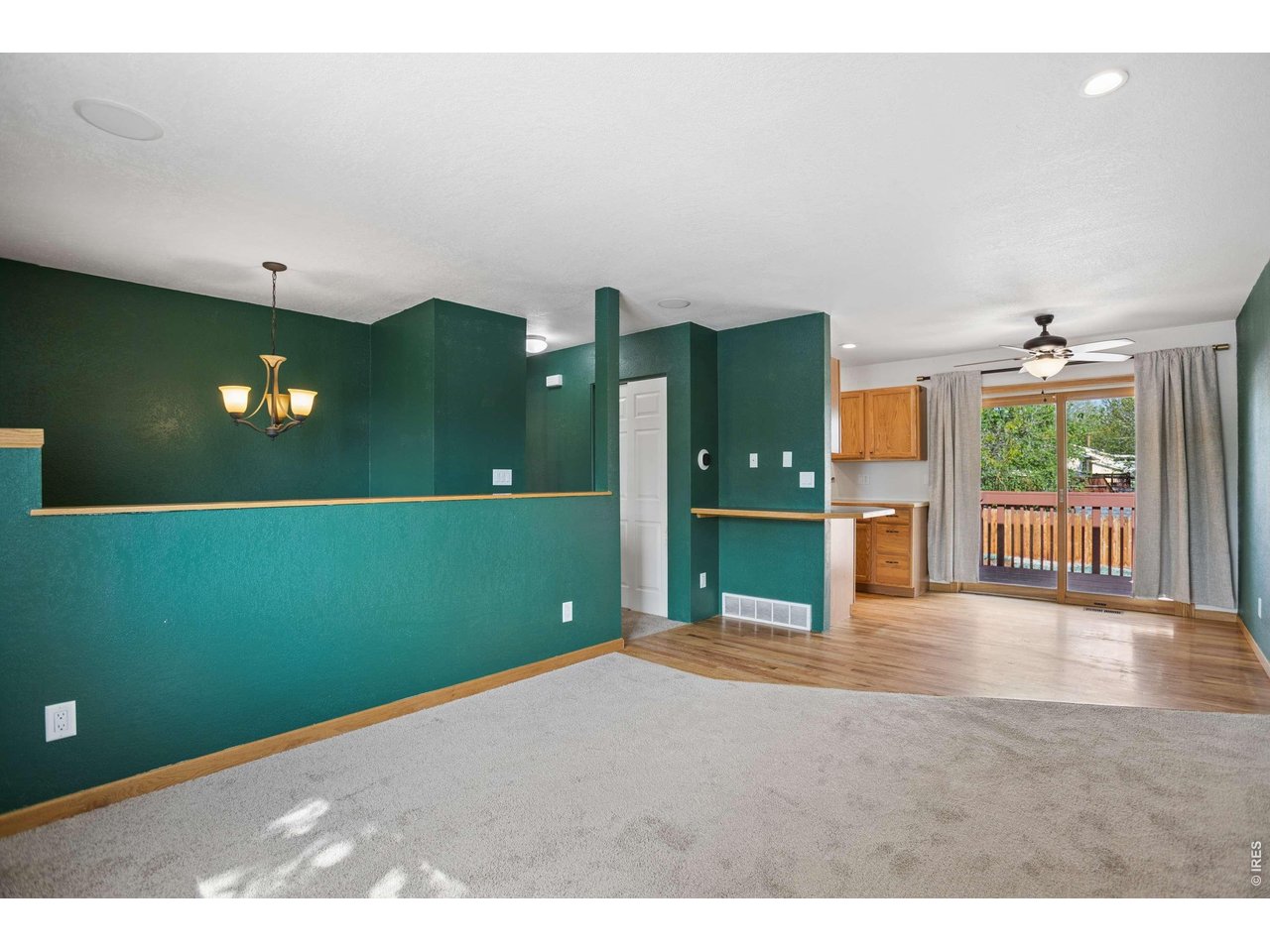 158 4th Street Firestone, CO 80520 - Photo 7 of 32 a living room with furniture and a flat screen tv