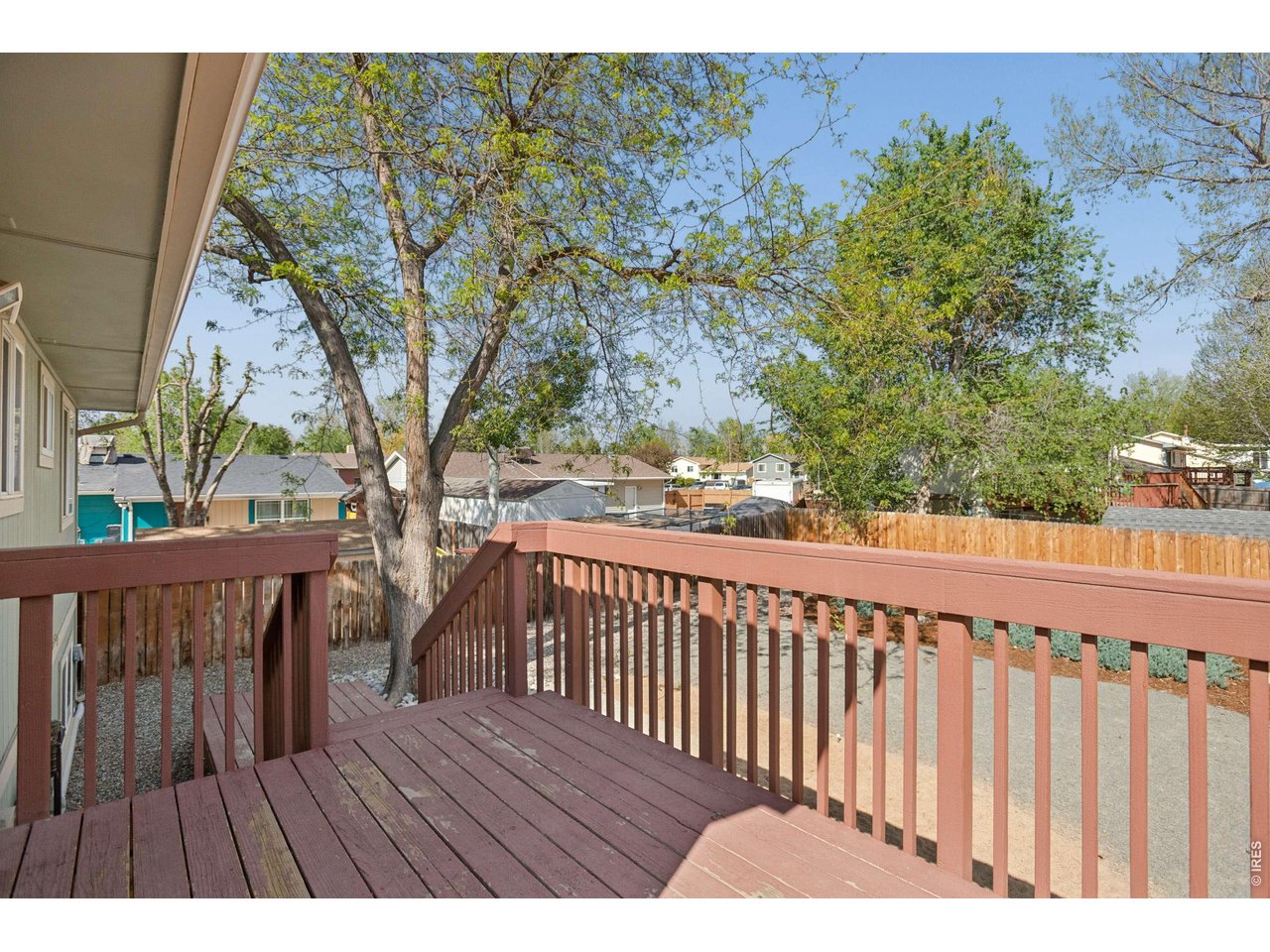 158 4th Street Firestone, CO 80520 - Photo 8 of 32 a view of outdoor space with deck and yard