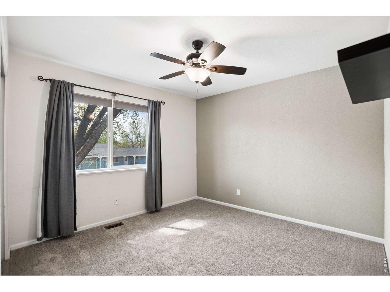 158 4th Street Firestone, CO 80520 - Photo 10 of 32 a view of an empty room with a window