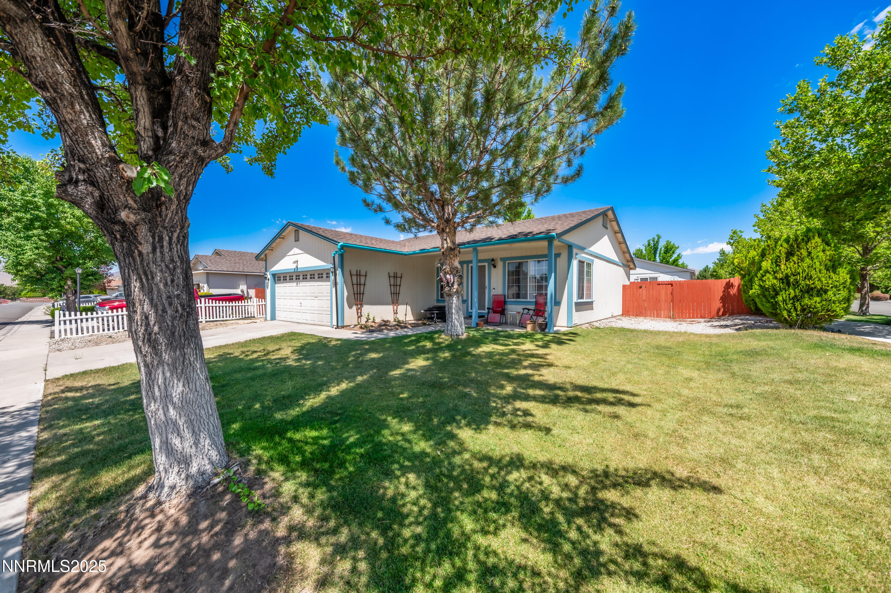 17523 Javalina Court Reno, NV 89508 - Photo 3 of 17 a front view of a house with garden