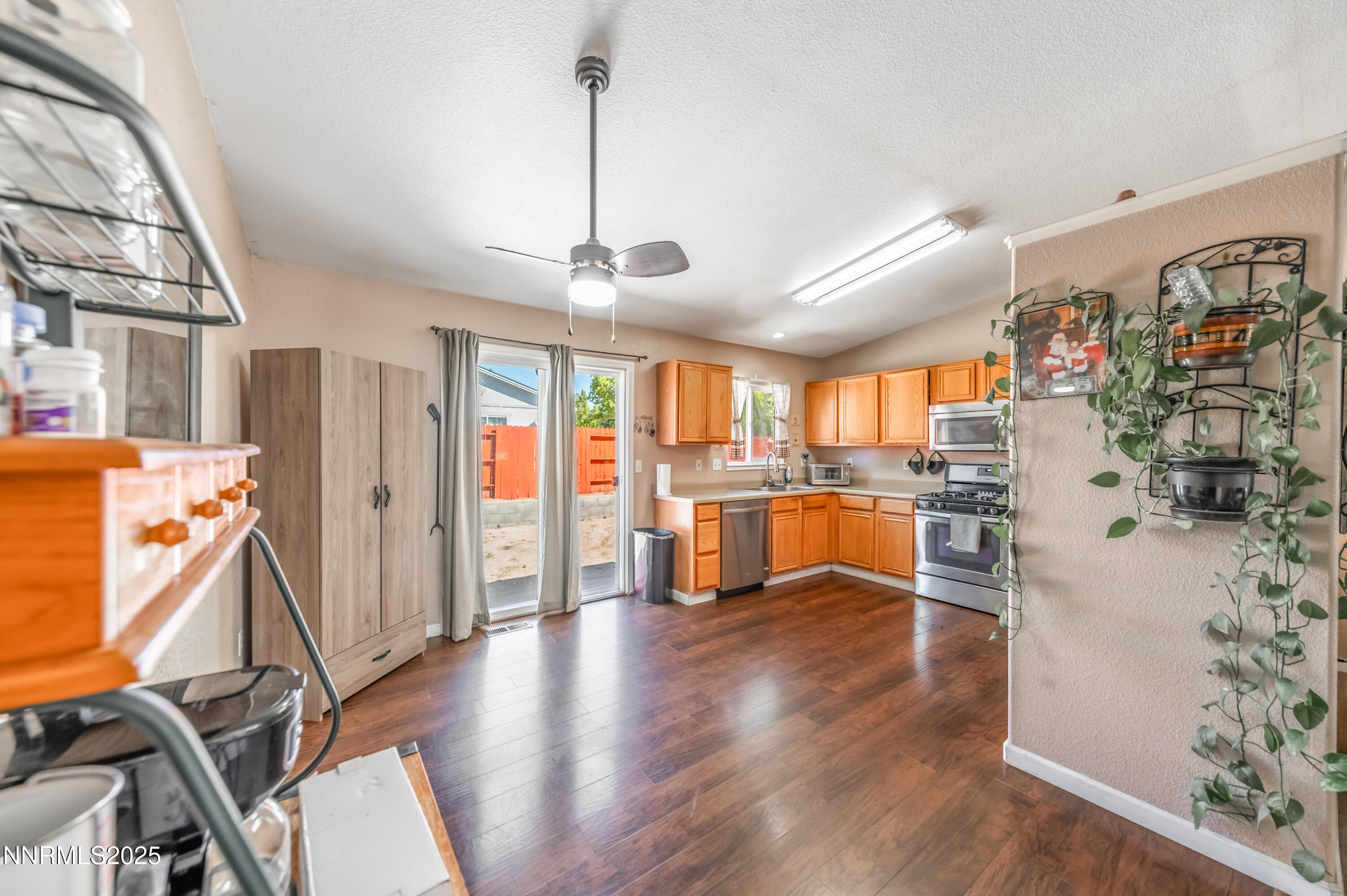 17523 Javalina Court Reno, NV 89508 - Photo 7 of 17 a view of a kitchen and dining room