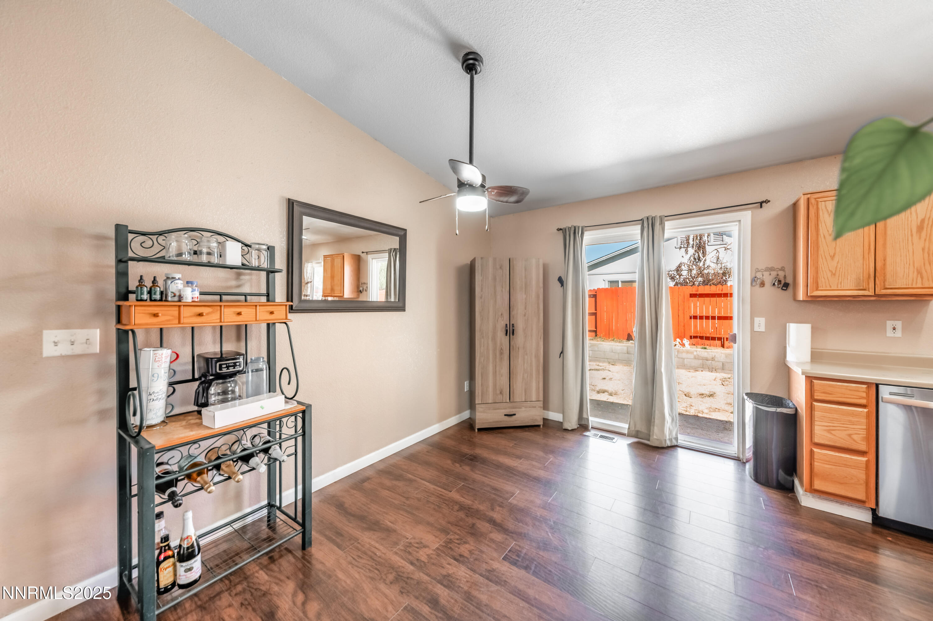 17523 Javalina Court Reno, NV 89508 - Photo 8 of 17 a view of a livingroom with furniture hardwood floor and a ceiling fan