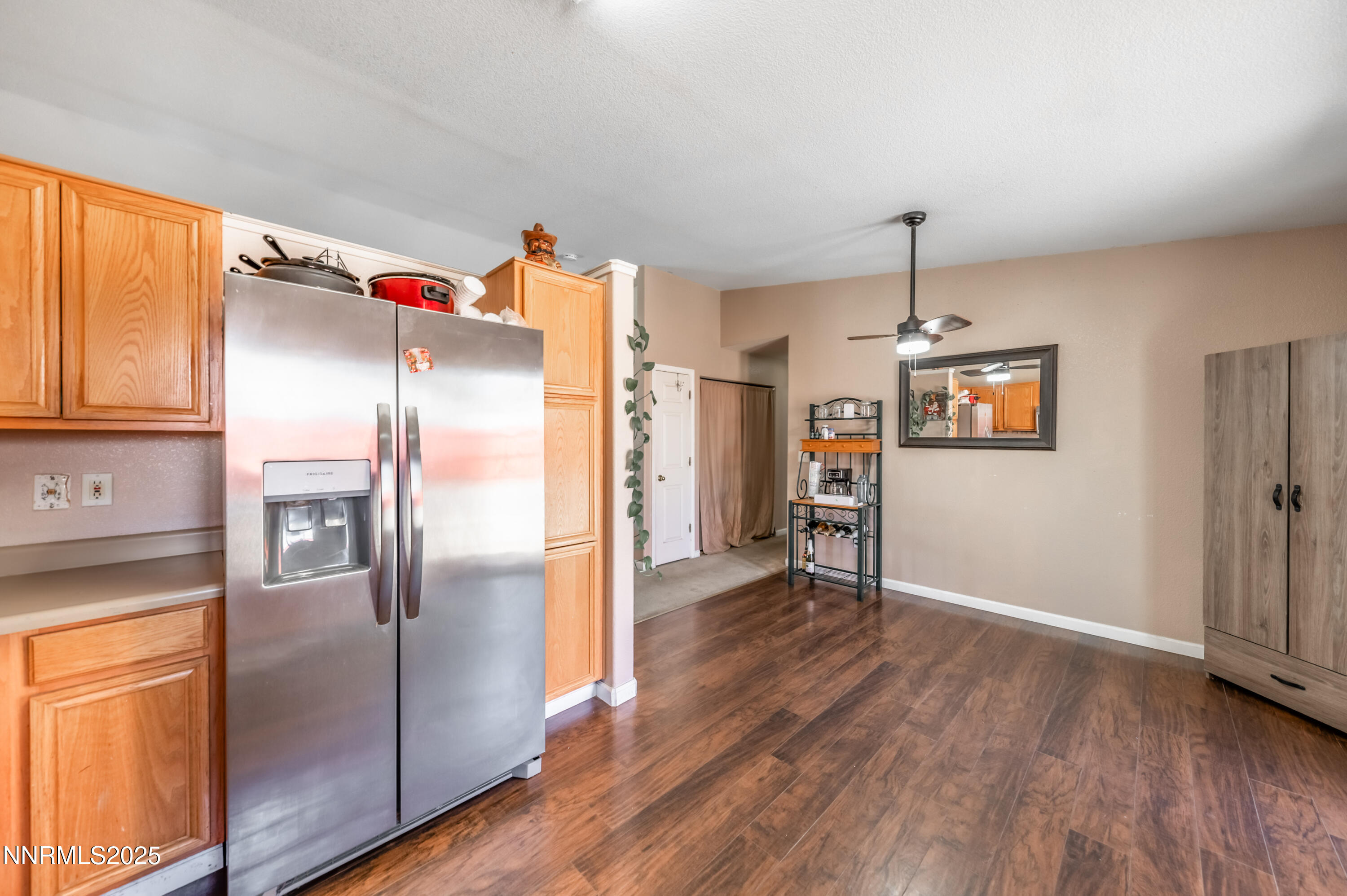 17523 Javalina Court Reno, NV 89508 - Photo 10 of 17 a kitchen with stainless steel appliances granite countertop a refrigerator and a sink