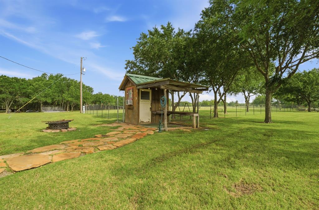 465 Emberson Ranch Road Pilot Point, TX 76258 - Photo 30 of 40 a view of a house with a big yard