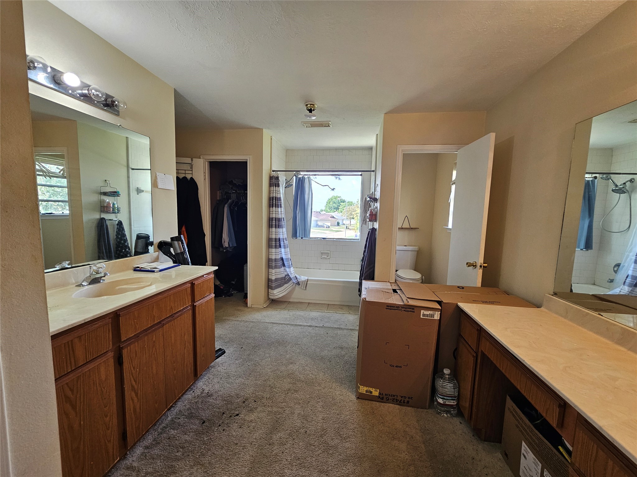 13615 Repa Lane Houston, TX 77014 - Photo 20 of 30 a room with a sink and a mirror