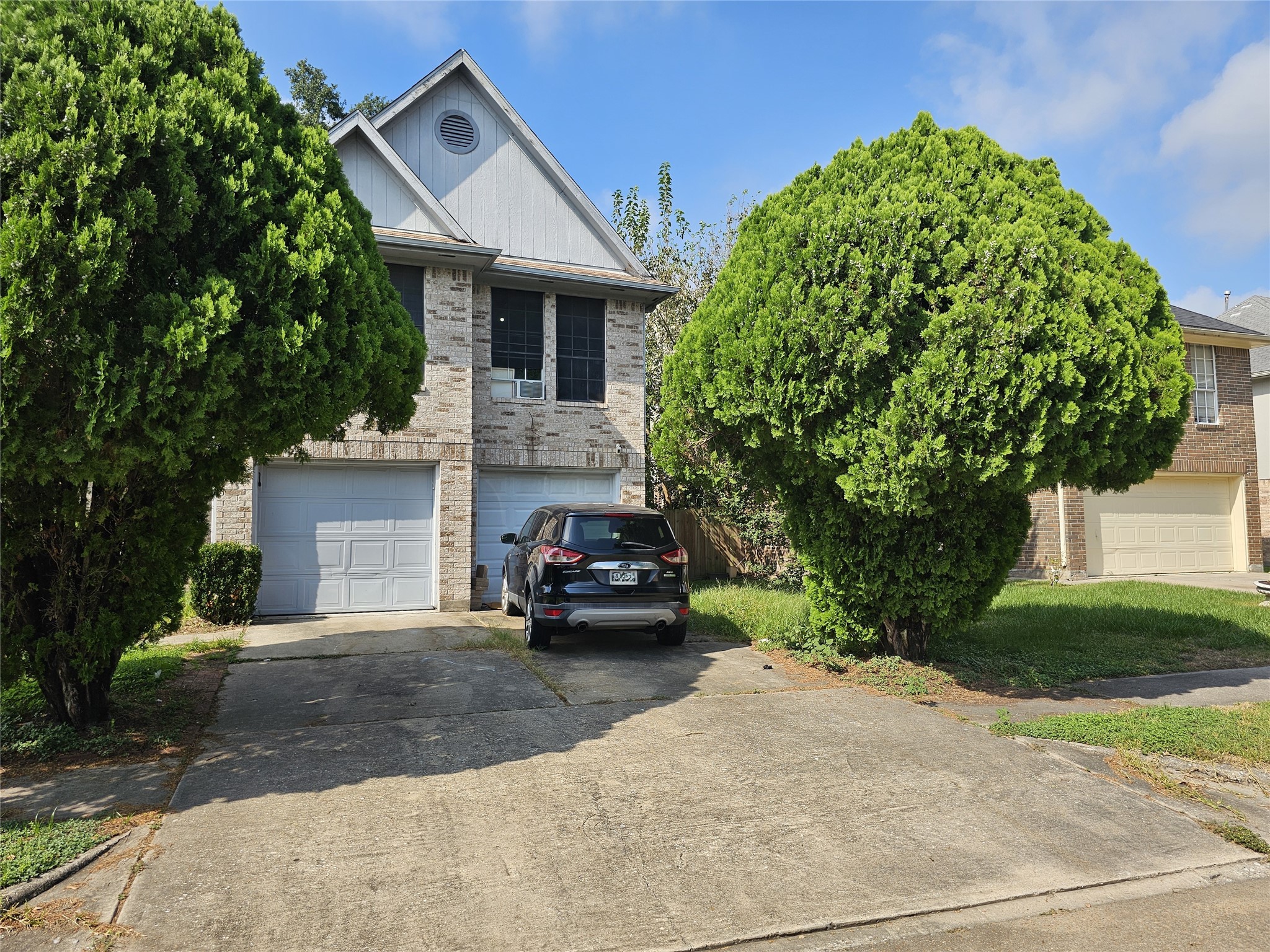 13615 Repa Lane Houston, TX 77014 - Photo 2 of 30 a view of a car parked in front of a house