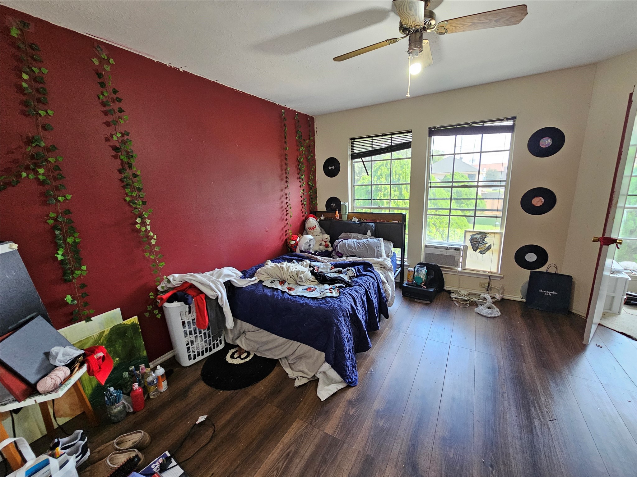 13615 Repa Lane Houston, TX 77014 - Photo 28 of 30 a bedroom with furniture and a wooden floor