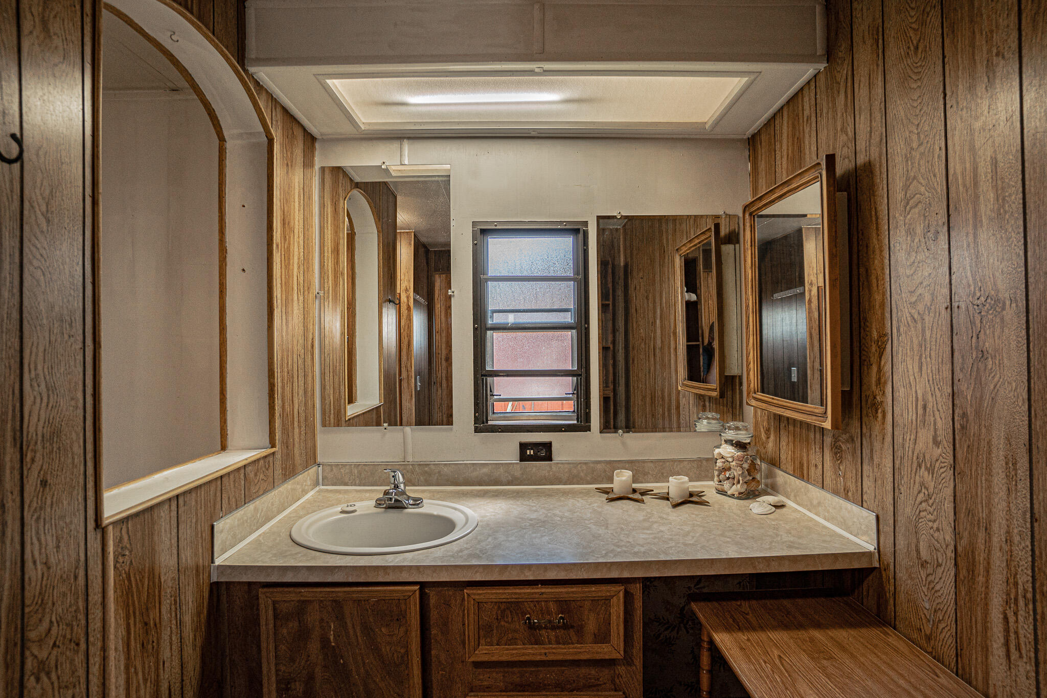 421 Stevens Road, Unit 26 Eagle Point, OR 97524 - Photo 13 of 23 a bathroom with a sink and a mirror