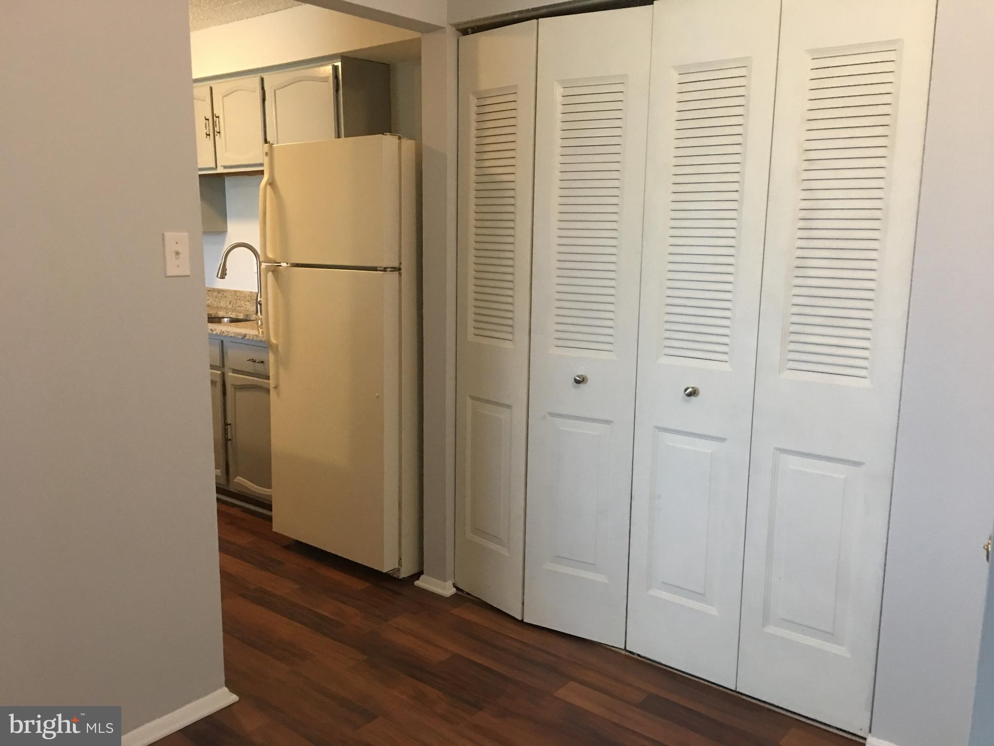 997 Heather Ridge Drive, Unit C Frederick, MD 21702 - Photo 3 of 14 Entry hall to kitchen and large closet