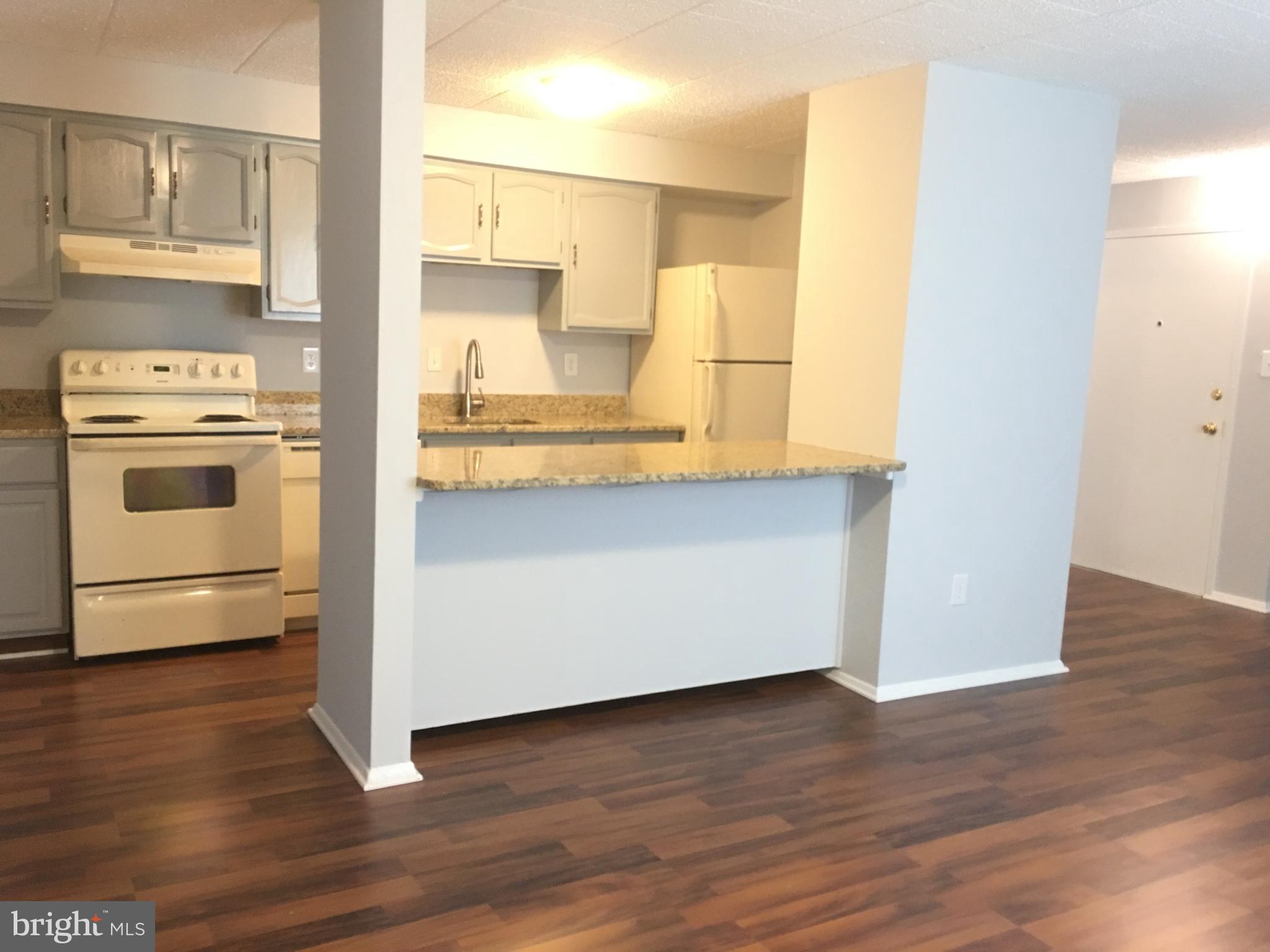 997 Heather Ridge Drive, Unit C Frederick, MD 21702 - Photo 5 of 14 Kitchen breakfast bar view from living room
