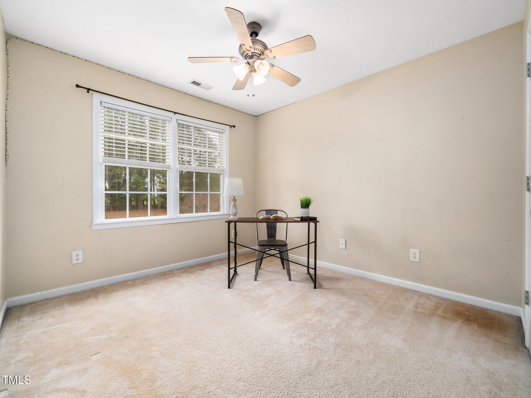 3690 Mabel Lane Stem, NC 27581 - Photo 22 of 37 a workspace with furniture and a window