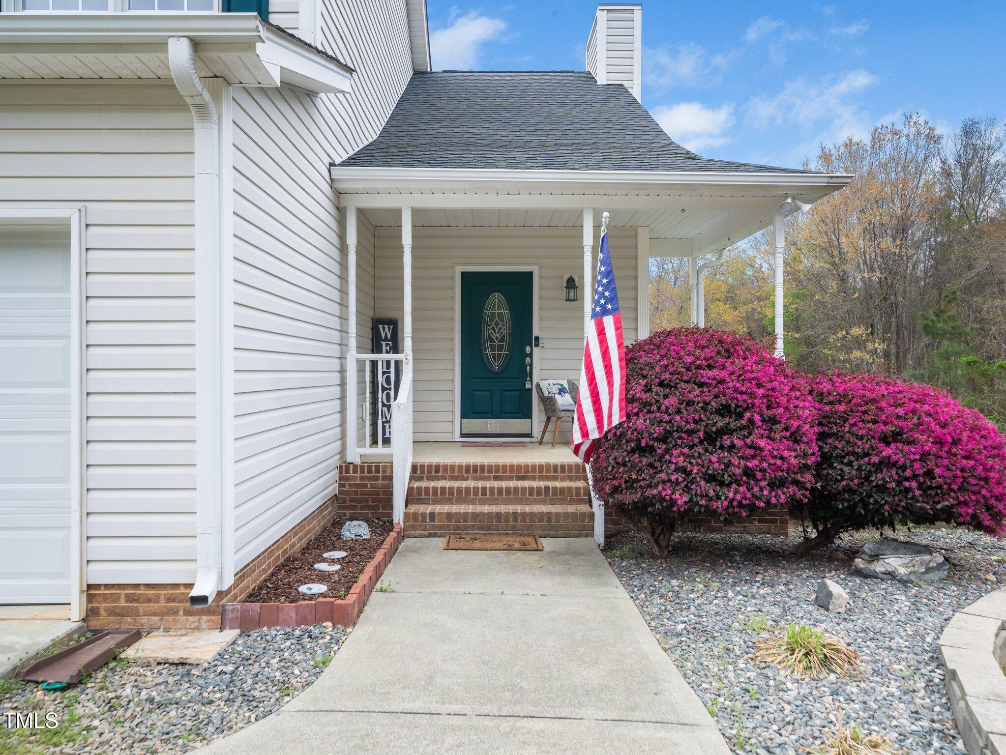 3690 Mabel Lane Stem, NC 27581 - Photo 24 of 37 a view of a house with a balcony