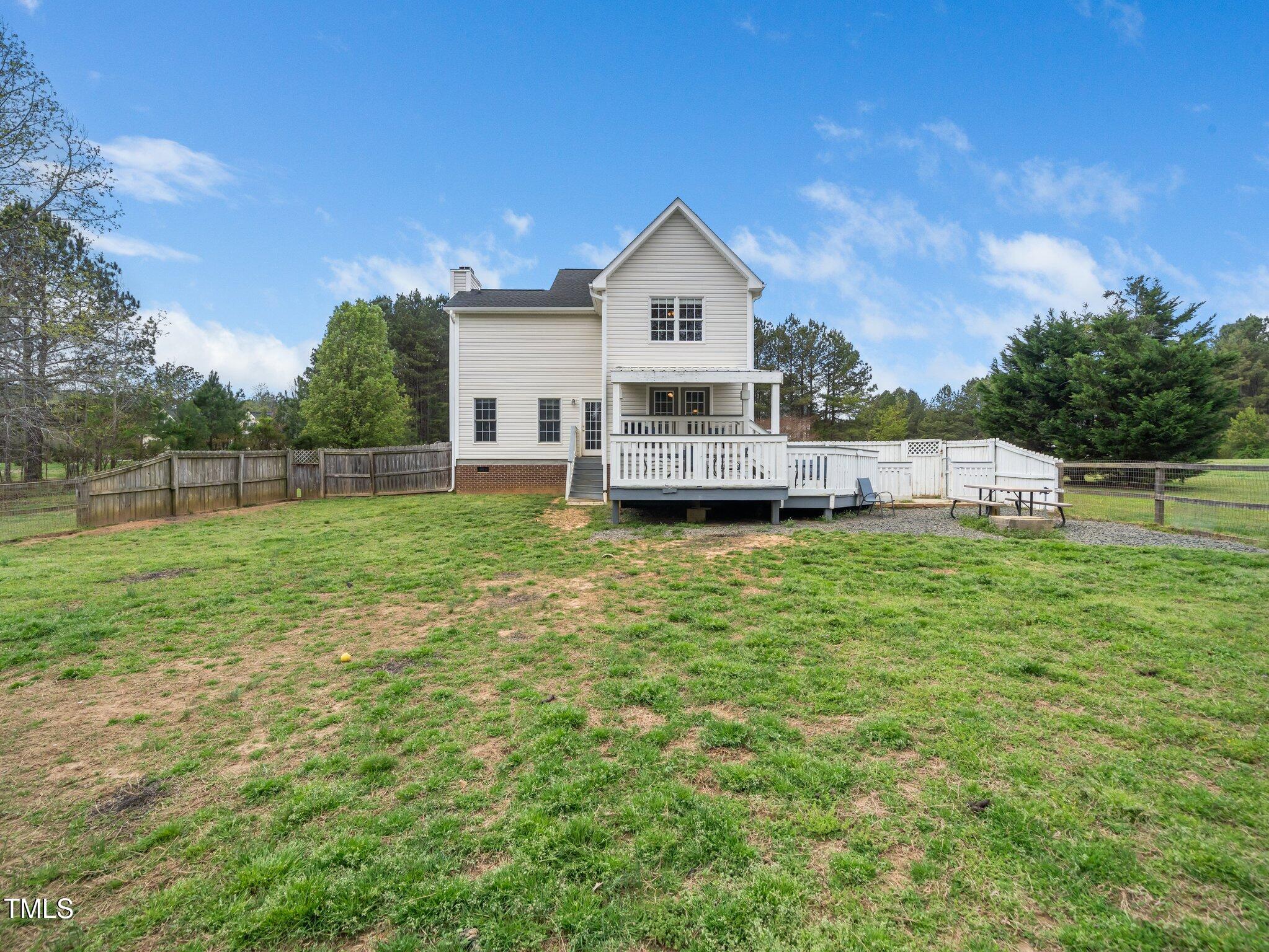 3690 Mabel Lane Stem, NC 27581 - Photo 26 of 37 a view of house with backyard area and entertaining space