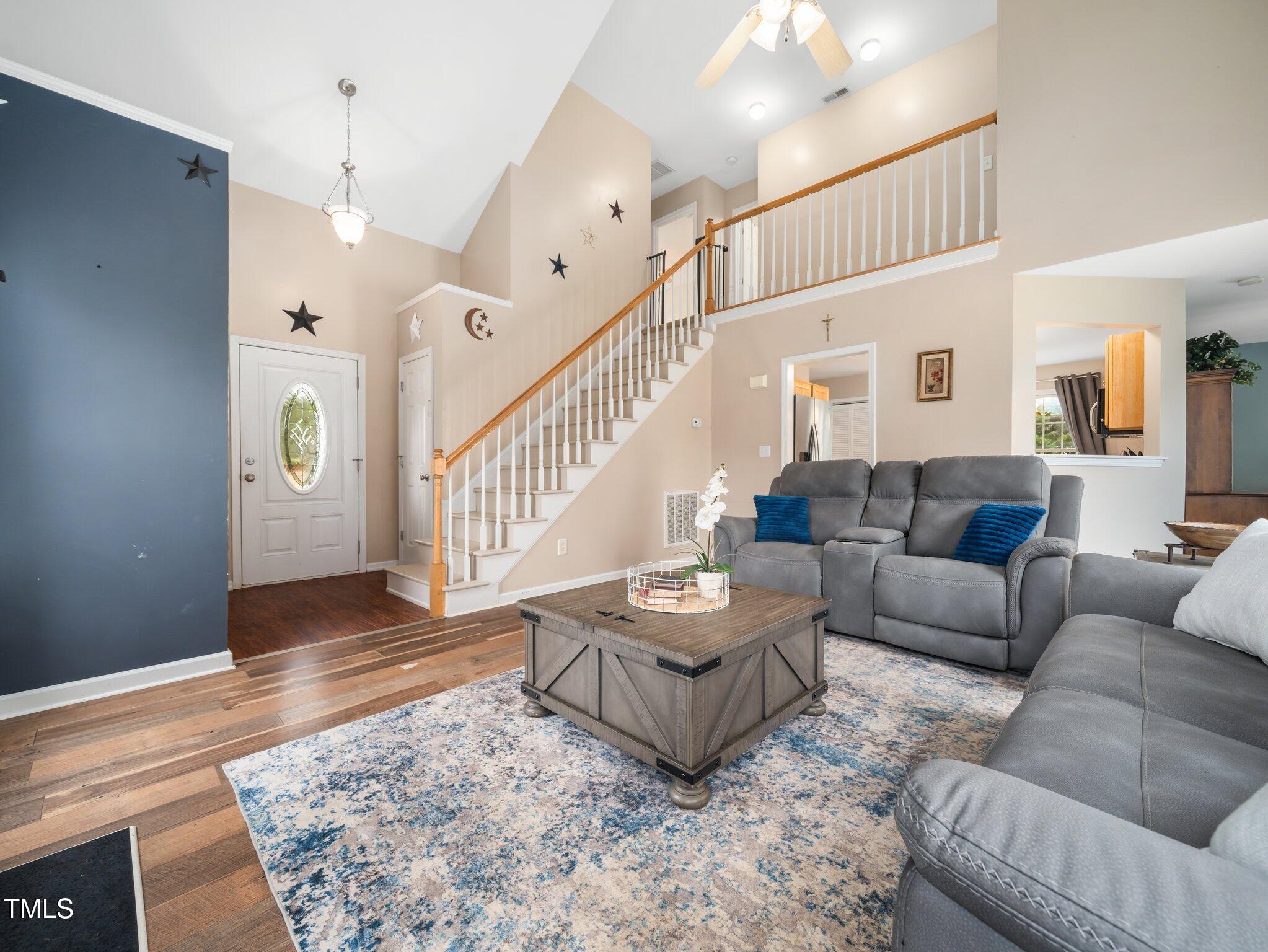 3690 Mabel Lane Stem, NC 27581 - Photo 6 of 37 a living room with furniture and wooden floor