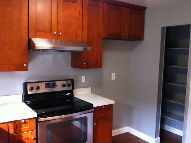 1231 Terra Nova Boulevard Pacifica, CA 94044 - Photo 5 of 18 a kitchen with a stove and a microwave