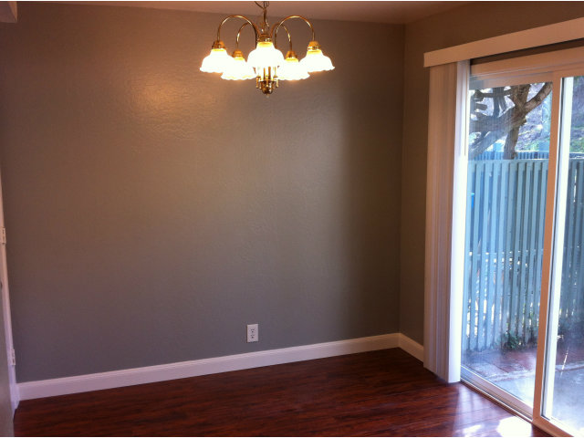 1231 Terra Nova Boulevard Pacifica, CA 94044 - Photo 6 of 18 a view of a room with wooden floor and a window